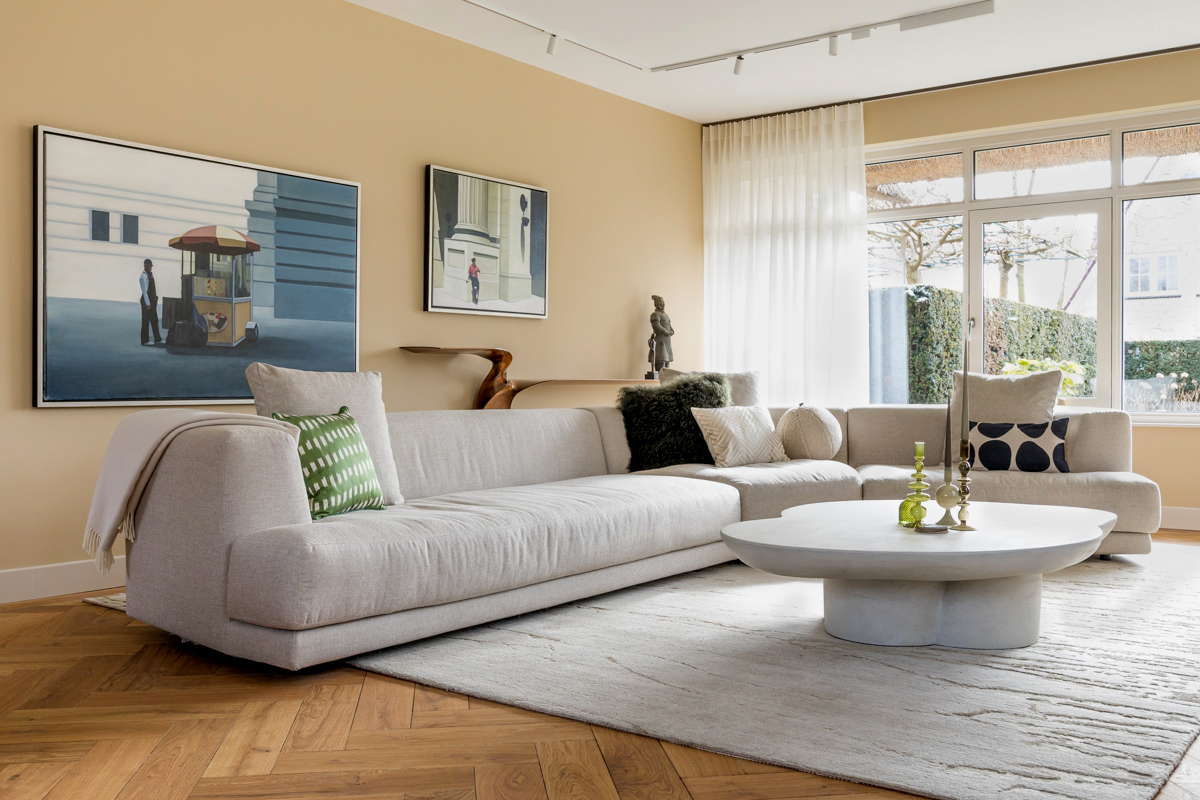 Woonkamer zithoek ontwerp met kunst luxe villa